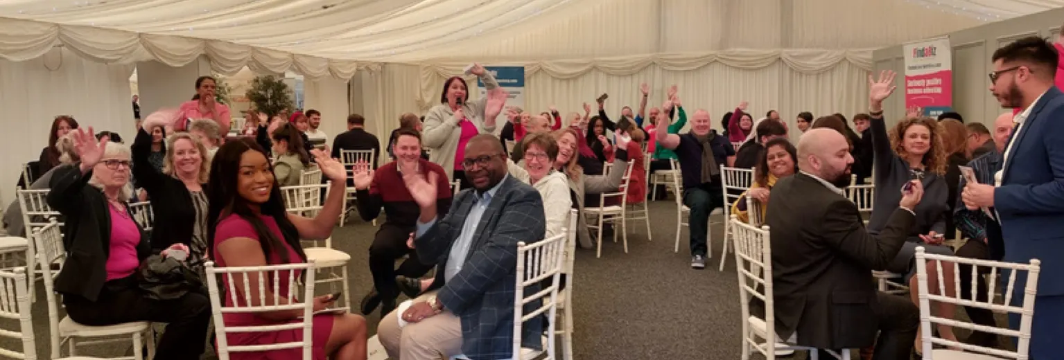 A room full of SWAP delegates with their hands up